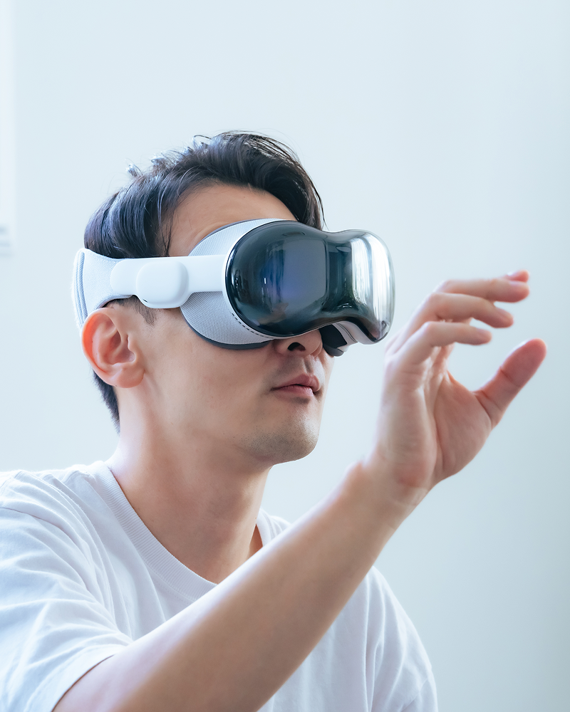 man wearing an apple vision pro