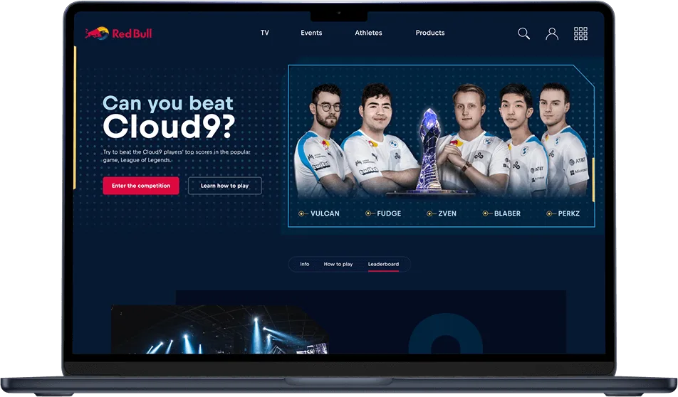 Laptop showing a Red Bull “Can you beat Cloud9?” campaign page with five esports players around a trophy