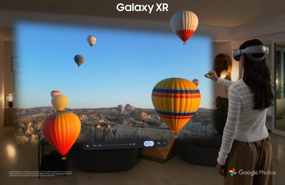 Galaxy XR promo: woman in a headset gestures at an immersive hot-air-balloon panorama filling her living room