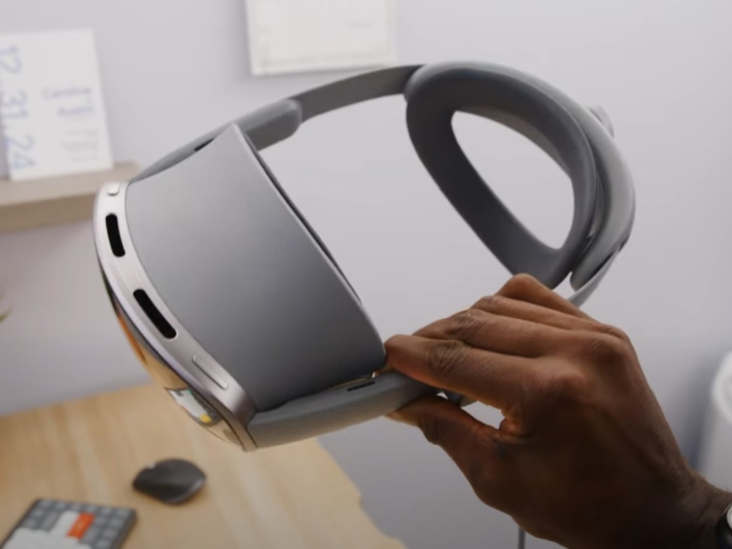 someone holding a galaxy xr headset