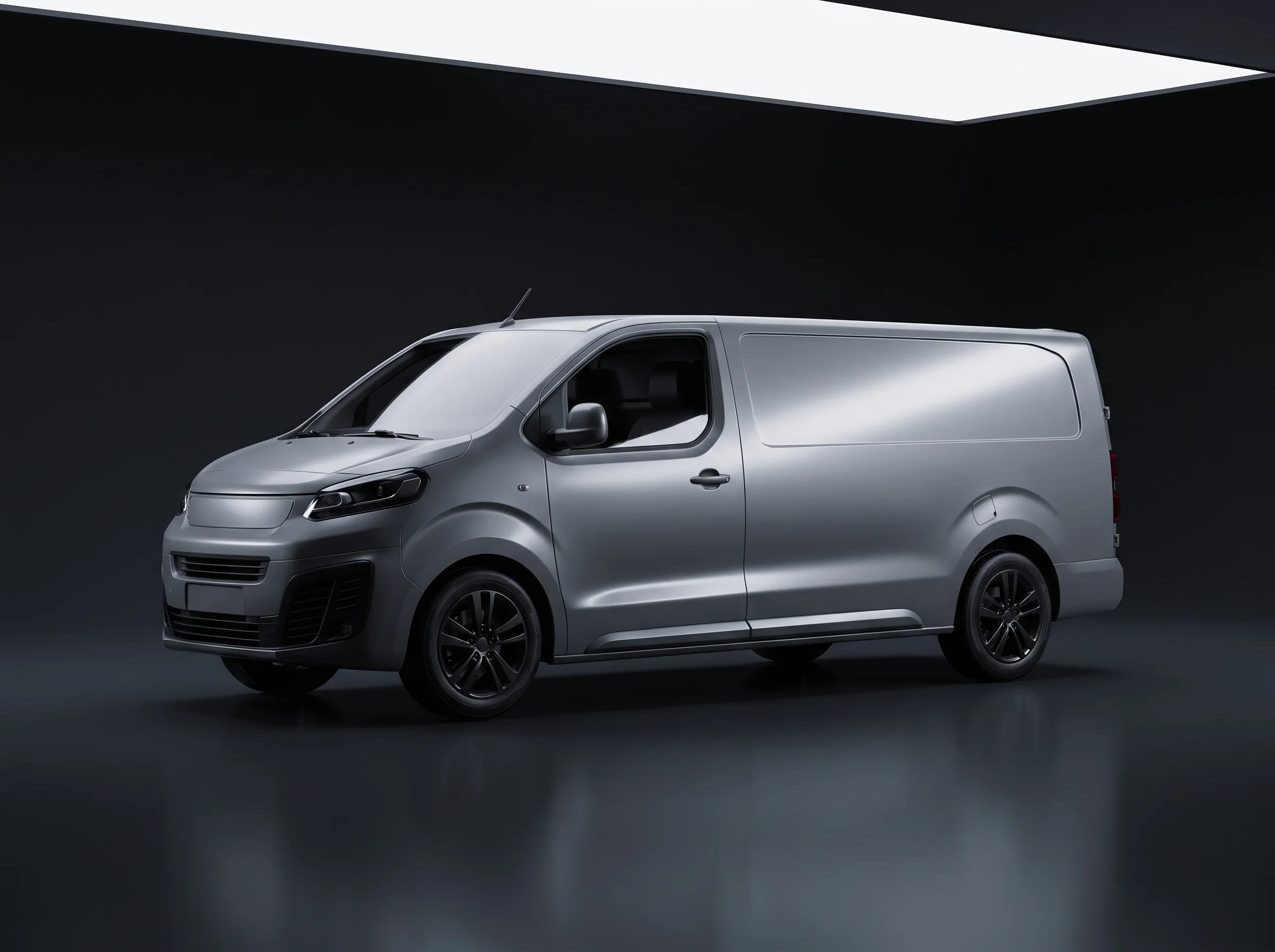 Unbranded electric delivery van photographed against a dark studio background