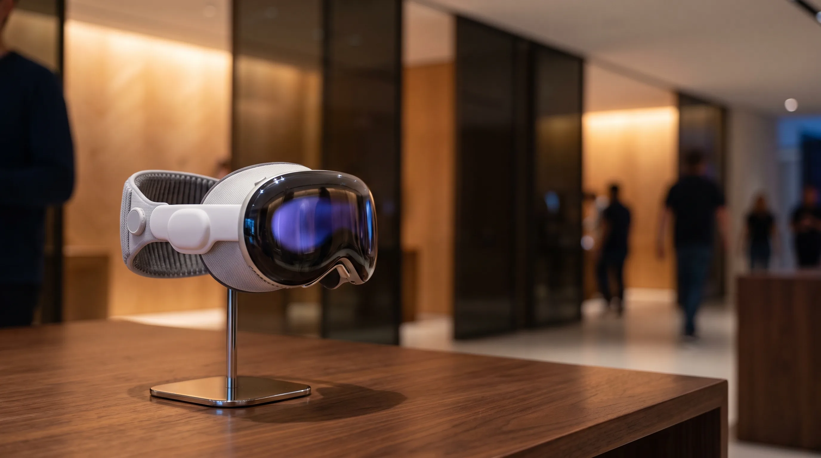 Apple Vision Pro on a display stand in a premium showroom — the headset used to stand inside digital twins