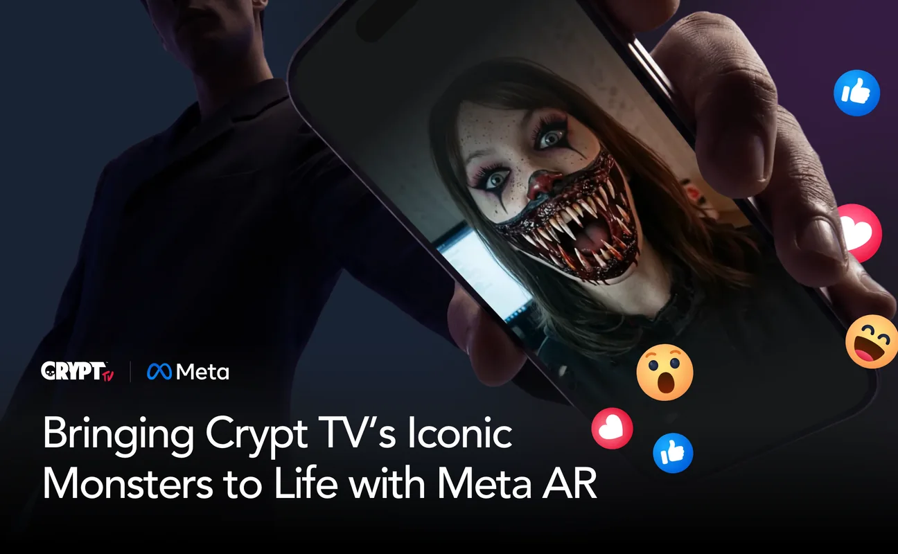 Hand holding a phone showing a fan wearing the Giggles the Clown AR mask, with floating Facebook reactions