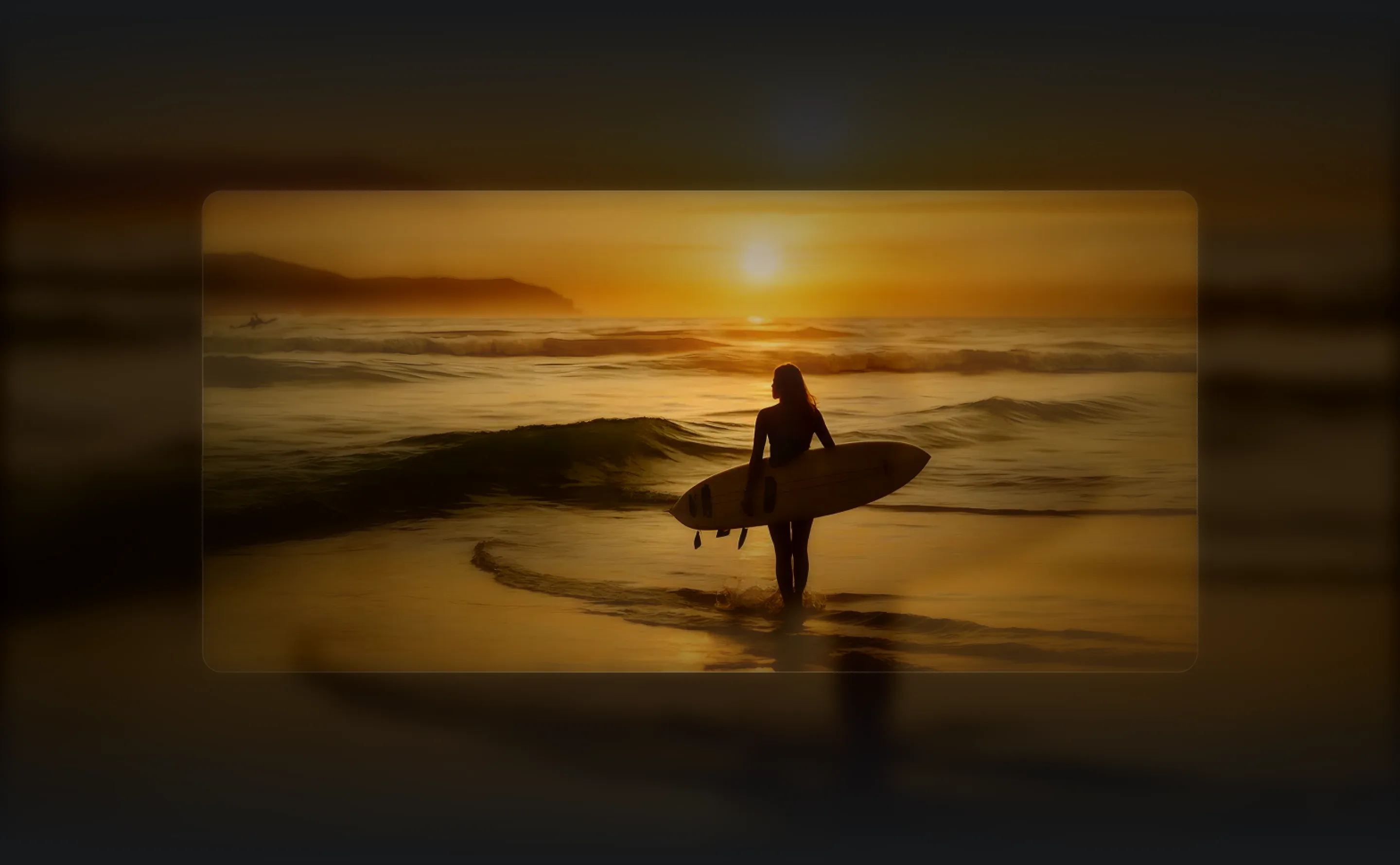 A surfer carrying her board into the waves at sunset