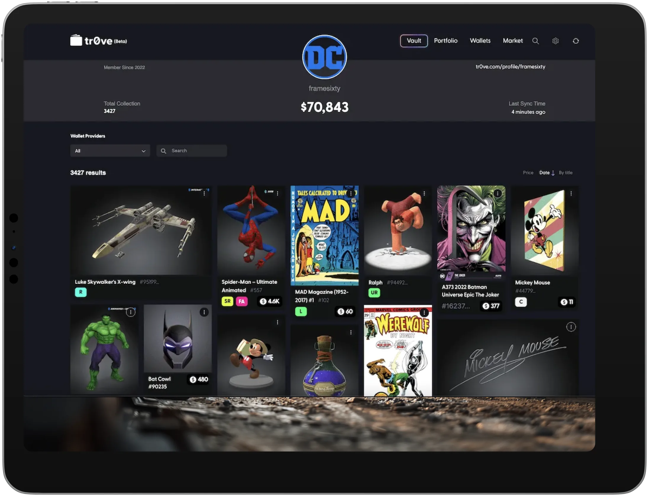Tr0ve web vault on a tablet: a DC-branded profile worth $70,843 above a grid of 3,427 collectibles